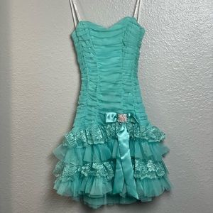 Strapless turquoise prom dress